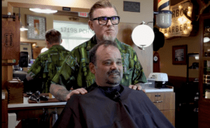 Image of Greg Krupa cutting a mans hair